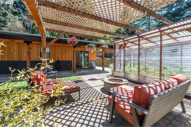 2345 Deady St, Port Orford, OR 97465 - view of patio / terrace featuring an outdoor living space with a fire pit, a pergola, and fence