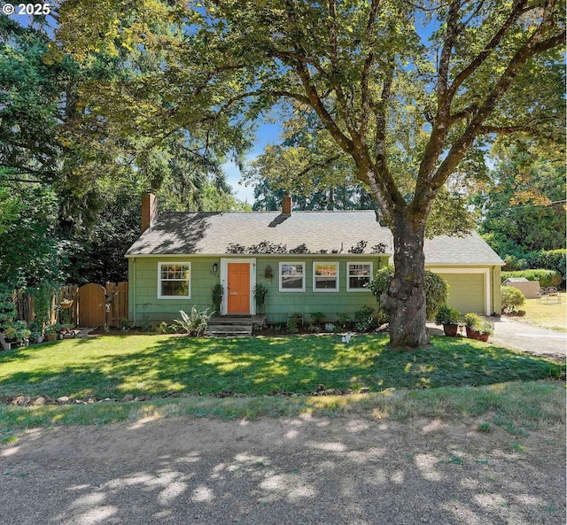 3374 Pioneer Dr, Salem, OR 97302 - view of front of home with a chimney, an attached garage, and driveway