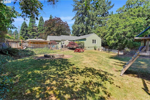 3374 Pioneer Dr, Salem, OR 97302 - fenced backyard with an outdoor fire pit