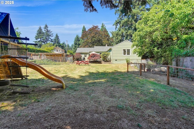 3374 Pioneer Dr, Salem, OR 97302 - fenced backyard featuring a playground