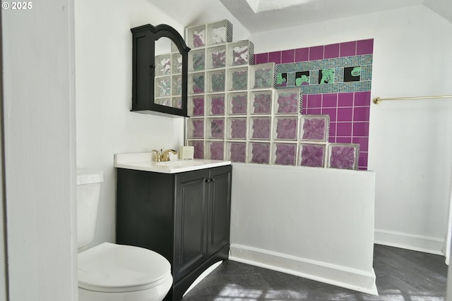 4820 SE Haig St, Portland, OR 97206 - full bathroom with toilet, baseboards, walk in shower, and vanity