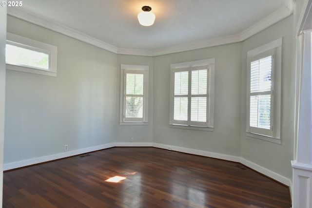 4820 SE Haig St, Portland, OR 97206 - empty room with ornamental molding, plenty of natural light, dark wood-type flooring, and baseboards