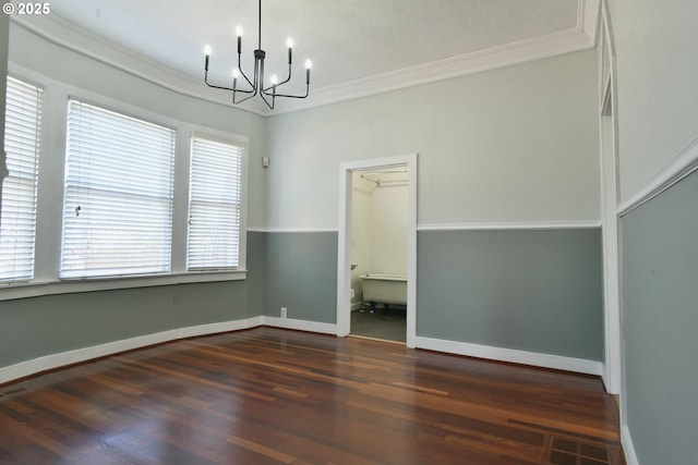 4820 SE Haig St, Portland, OR 97206 - spare room with a chandelier, wood finished floors, crown molding, and baseboards