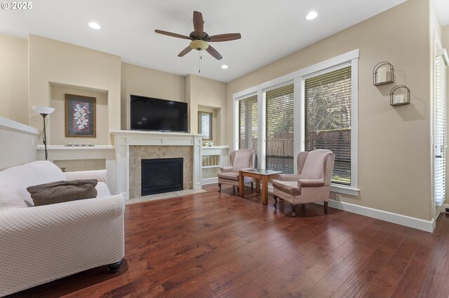 27387 SW Copper Creek Loop, Wilsonville, OR 97070 - living area with a tile fireplace, hardwood / wood-style flooring, ceiling fan, and recessed lighting