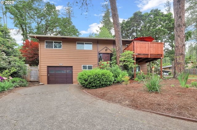 4574 Manzanita St, Eugene, OR 97405 - view of front facade featuring an attached garage and asphalt driveway