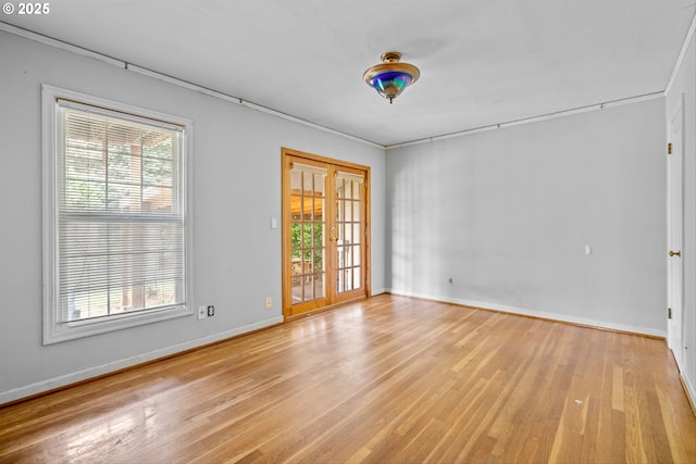 4715 N Willamette Blvd, Portland, OR 97203 - spare room with healthy amount of natural light, light wood-style flooring, and ornamental molding