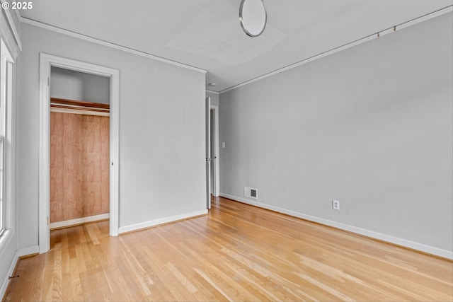 4715 N Willamette Blvd, Portland, OR 97203 - unfurnished bedroom with ornamental molding, wood finished floors, and a closet