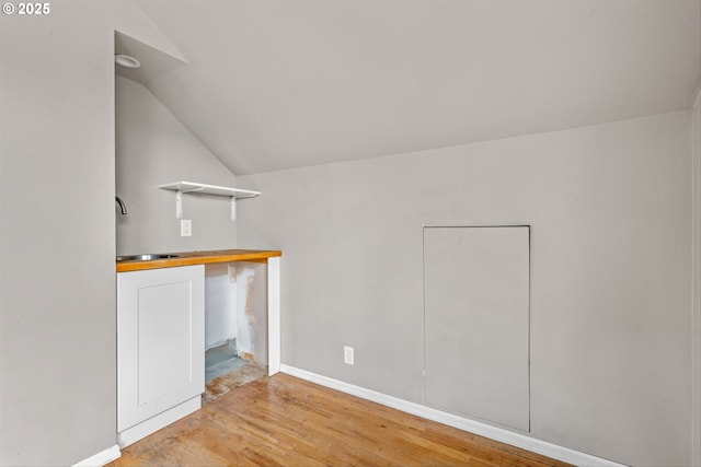 4715 N Willamette Blvd, Portland, OR 97203 - empty room with vaulted ceiling and light wood-type flooring