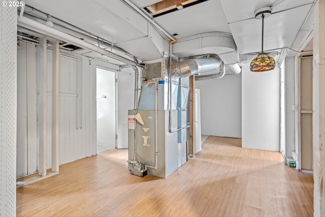 4715 N Willamette Blvd, Portland, OR 97203 - below grade area with wood finished floors and heating unit