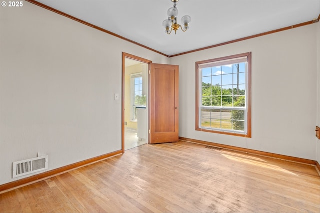 4715 N Willamette Blvd, Portland, OR 97203 - unfurnished room featuring light wood-style flooring, a chandelier, and crown molding