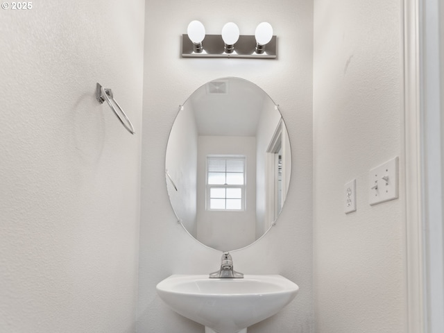 bathroom featuring a sink