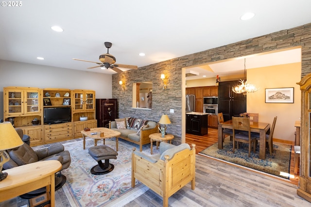 6065 Cherry Heights Rd, The Dalles, OR 97058 - living area featuring light wood-style floors, a ceiling fan, recessed lighting, and a chandelier