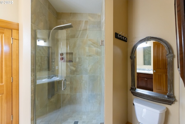 6065 Cherry Heights Rd, The Dalles, OR 97058 - bathroom with toilet, a stall shower, and vanity