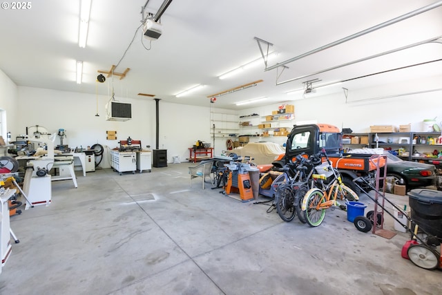 6065 Cherry Heights Rd, The Dalles, OR 97058 - garage featuring a workshop area and a garage door opener