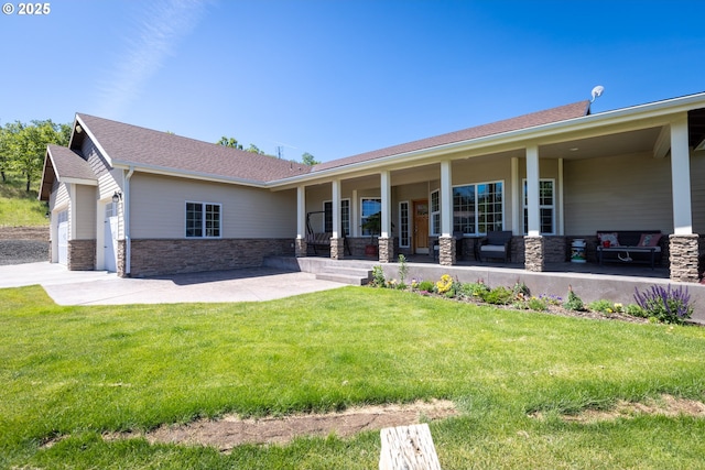 6065 Cherry Heights Rd, The Dalles, OR 97058 - view of front facade with stone siding, a front yard, a porch, and roof with shingles