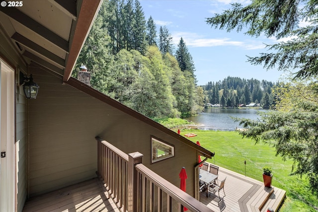 71848 Northshore Dr, Birkenfeld, OR 97016 - exterior space featuring a view of trees, outdoor dining space, and a deck with water view