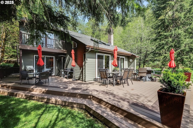 71848 Northshore Dr, Birkenfeld, OR 97016 - back of house with outdoor dining space, a chimney, and a deck