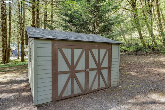 71848 Northshore Dr, Birkenfeld, OR 97016 - view of shed featuring a wooded view