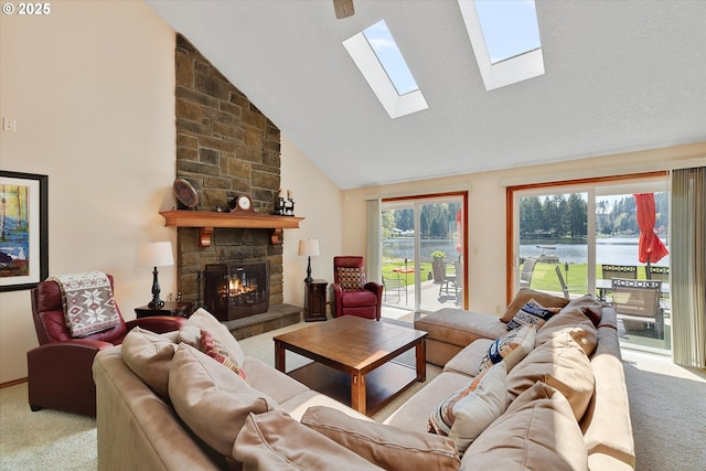 71848 Northshore Dr, Birkenfeld, OR 97016 - carpeted living area with a water view, a skylight, a fireplace, and high vaulted ceiling