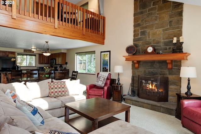 71848 Northshore Dr, Birkenfeld, OR 97016 - carpeted living room with a stone fireplace