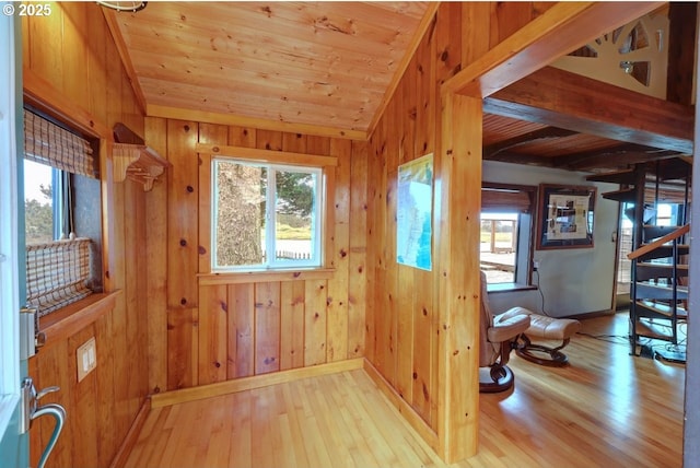 604 15th Ave, Seaside, OR 97138 - entrance foyer featuring plenty of natural light, hardwood / wood-style floors, vaulted ceiling, wood walls, and wooden ceiling