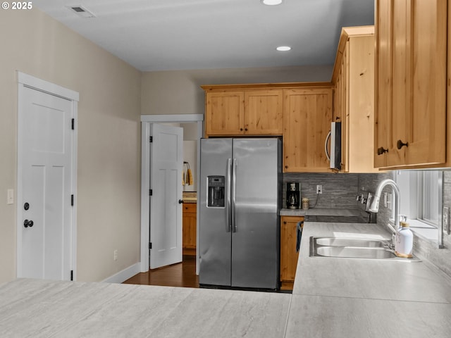 883 Washington St, Lafayette, OR 97127 - kitchen featuring appliances with stainless steel finishes, a sink, light countertops, decorative backsplash, and recessed lighting