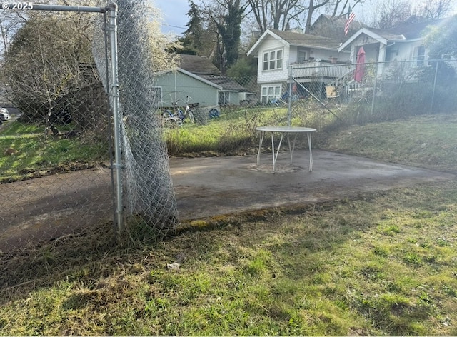 view of yard featuring a patio and fence