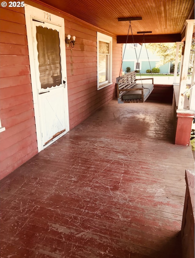 wooden deck with covered porch