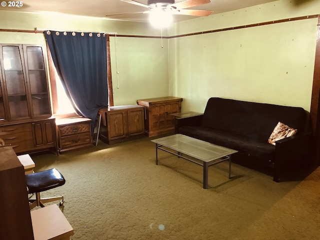 sitting room with carpet flooring and ceiling fan