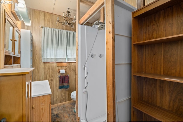 721 Columbia Blvd, Saint Helens, OR 97051 - bathroom featuring vanity, a chandelier, and wood walls