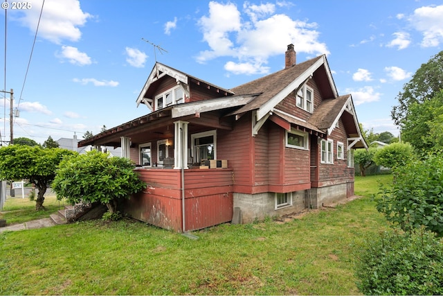 721 Columbia Blvd, Saint Helens, OR 97051 - view of side of home with a lawn, a chimney, and a shingled roof