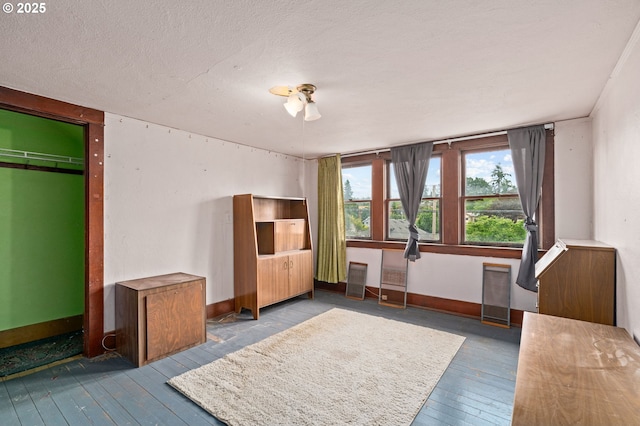 721 Columbia Blvd, Saint Helens, OR 97051 - unfurnished bedroom featuring wood-type flooring and baseboards