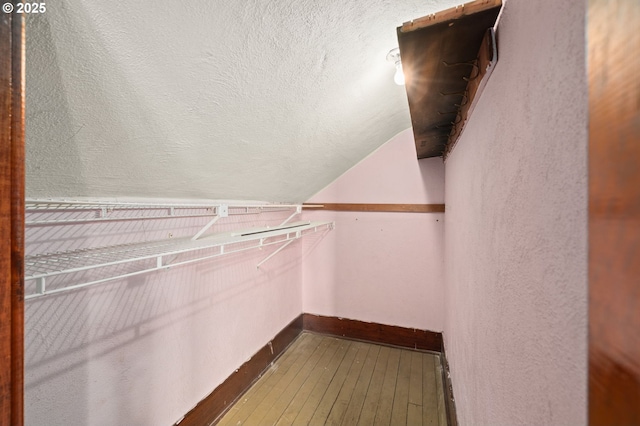 721 Columbia Blvd, Saint Helens, OR 97051 - walk in closet featuring wood-type flooring and vaulted ceiling