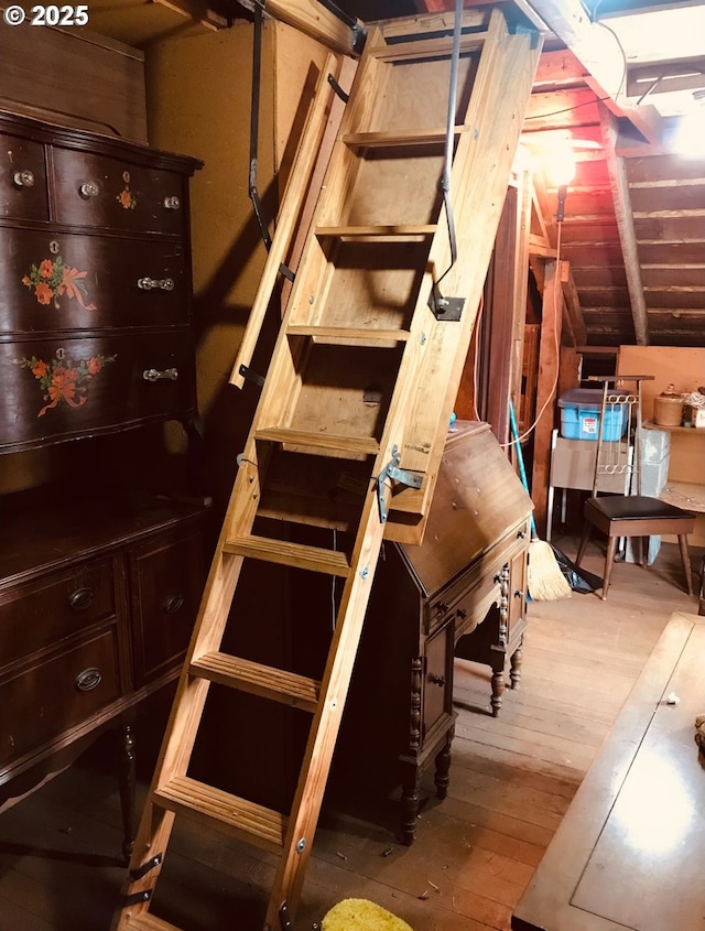 basement featuring hardwood / wood-style floors