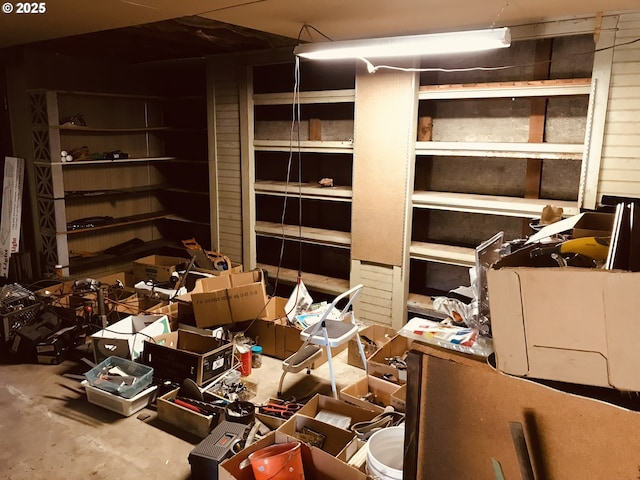 misc room with unfinished concrete flooring