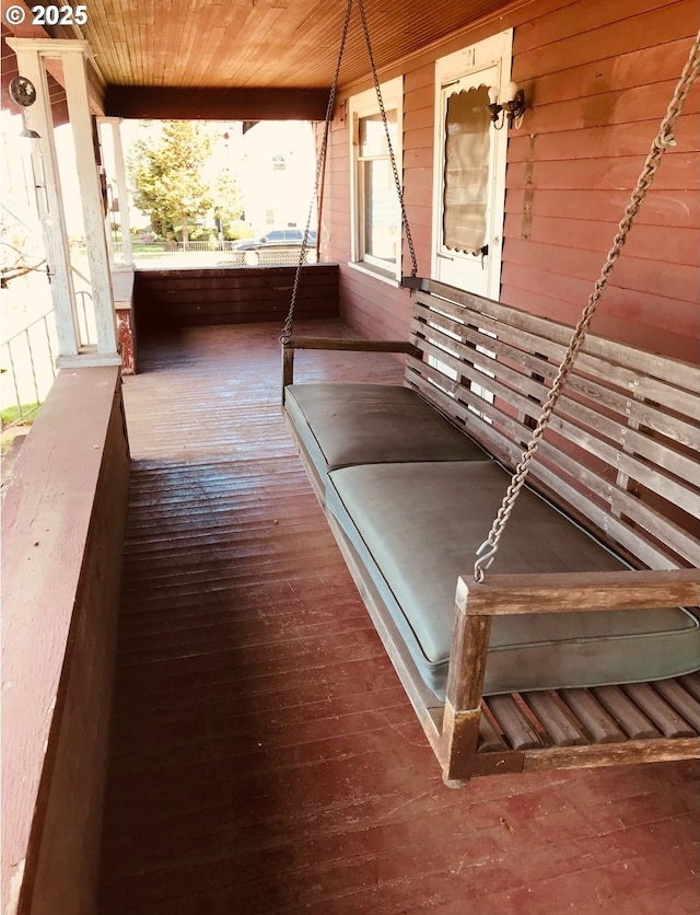 balcony featuring a porch