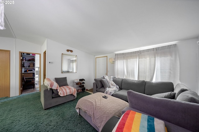 living room with carpet and lofted ceiling
