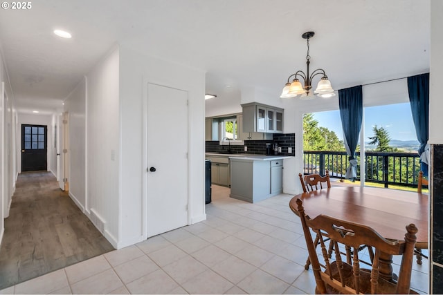 20700 SW Cherry Hill Rd, Sheridan, OR 97378 - dining area featuring a chandelier and light tile patterned flooring