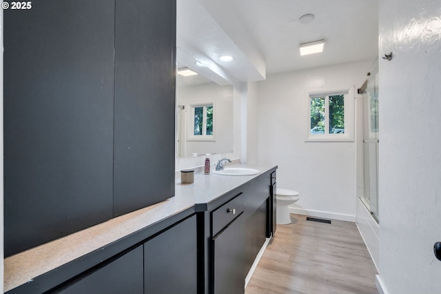 20700 SW Cherry Hill Rd, Sheridan, OR 97378 - full bath featuring healthy amount of natural light, vanity, a shower with door, wood finished floors, and recessed lighting