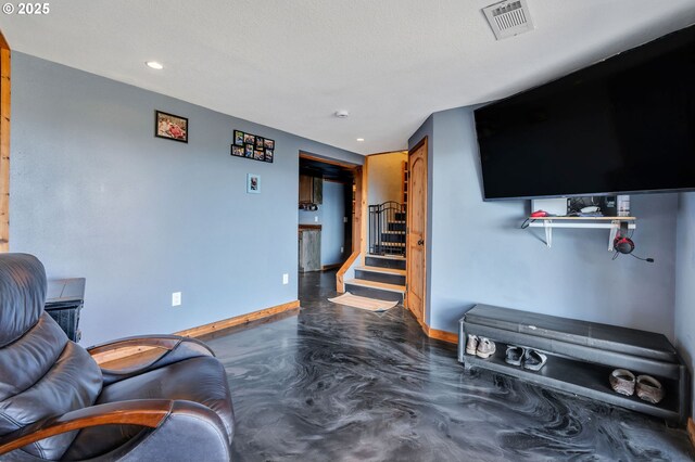20700 SW Cherry Hill Rd, Sheridan, OR 97378 - living area with finished concrete floors, recessed lighting, and stairs