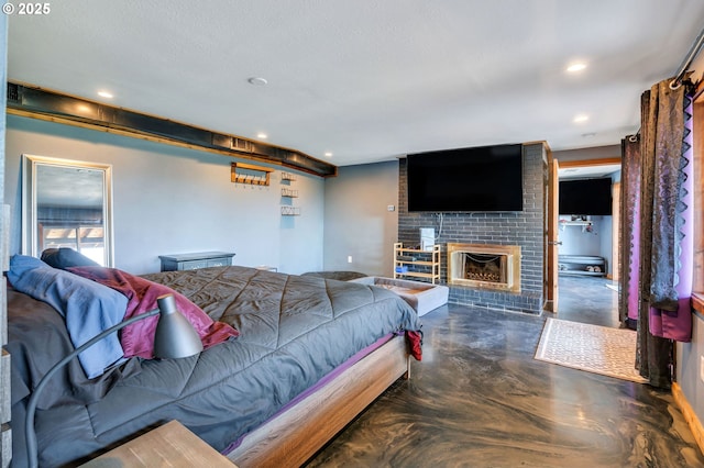 20700 SW Cherry Hill Rd, Sheridan, OR 97378 - bedroom with finished concrete floors, a fireplace, and recessed lighting