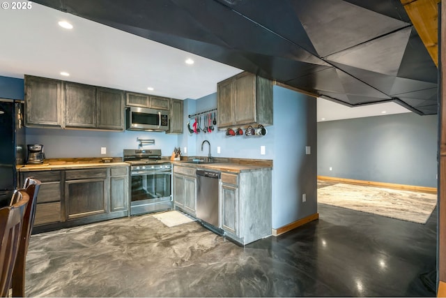 20700 SW Cherry Hill Rd, Sheridan, OR 97378 - kitchen featuring stainless steel appliances, recessed lighting, and concrete flooring