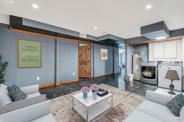 20700 SW Cherry Hill Rd, Sheridan, OR 97378 - living room featuring water heater, separate washer and dryer, recessed lighting, and concrete floors