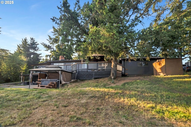 20700 SW Cherry Hill Rd, Sheridan, OR 97378 - view of green lawn featuring a hot tub and a deck