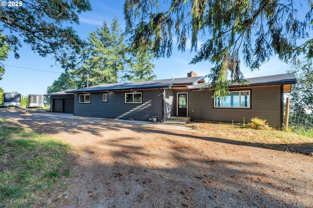 20700 SW Cherry Hill Rd, Sheridan, OR 97378 - view of front of property featuring a chimney, a garage, and dirt driveway