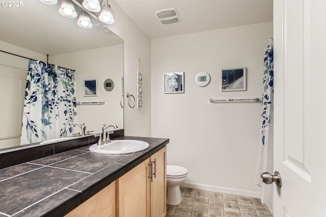 390 NW 116th Ave Unit 103, Portland, OR 97229 - full bathroom with vanity and a shower with curtain