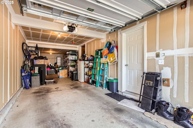 390 NW 116th Ave Unit 103, Portland, OR 97229 - garage featuring a garage door opener