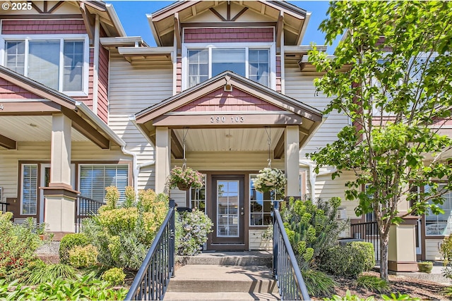 390 NW 116th Ave Unit 103, Portland, OR 97229 - doorway to property featuring covered porch