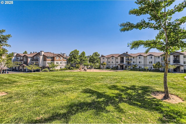 390 NW 116th Ave Unit 103, Portland, OR 97229 - view of community with a residential view and a yard