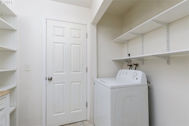laundry area with washer / dryer and laundry area